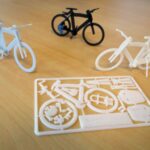 Velo miniatures en stereolithograpie pour annoncer les vacances estivales de l'impression 3D, Axis spécialiste du prototypage
